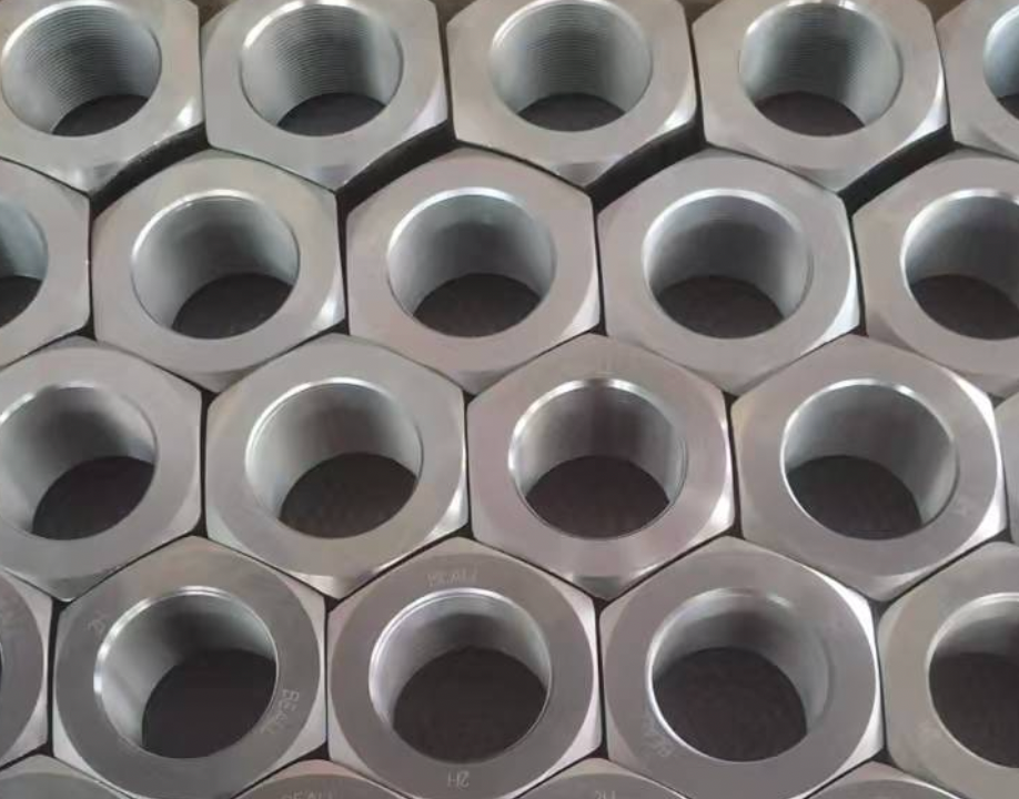 ASTM A194 / A194M (ASME B18.2.2)  Heavy Hex Nut Brinell Hardness: 248–352 HBW; Proof Load: 175,000 psi (UNC) Zinc Plated (Clear/Blue/Yellow), HDG, Black Oxide, Cadmium Plated, Plain/Oiled